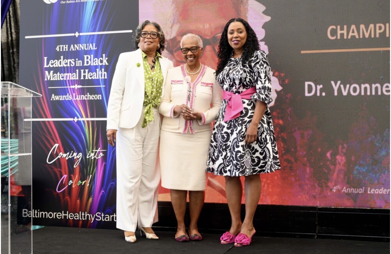 Dr. Yvonne Bronner receiving award